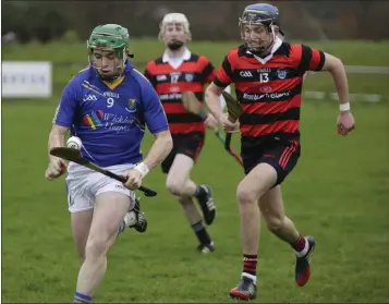  ??  ?? Wicklow captain Christy Moorehouse is chased by Cian O’Rian Broin.