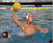  ?? PHOTO BY HOWARD FRESHMAN ?? Wilson's Antonio Loria-Apuzzo, who scored in the second half, raises up as he passes the ball during the Bruins' 18-0 victory over Lakewood at the Moore League Showcase.