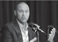  ?? AP file photo ?? Miami Marlins CEO Derek Jeter has come under scrutiny from agent Scott Boras, who said Jeter and his ownership group are turning the Marlins into a pawn shop.