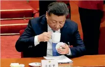  ?? JASON LEE/REUTERS ?? Like millions of Chinese, President Xi Jinping enjoys a refreshing cup of tea and many of them are adding cream cheese to their brews.