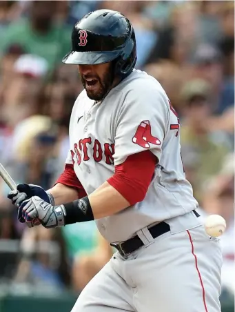  ?? GEtty IMaGEs ?? SIDELINED: J.D. Martinez, seen here getting hit by a pitch during Sunday’s game against the Nationals, won’t need surgery on his injured ankle.