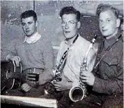  ??  ?? Jazz: George, in glasses, at Stalag xx1-D