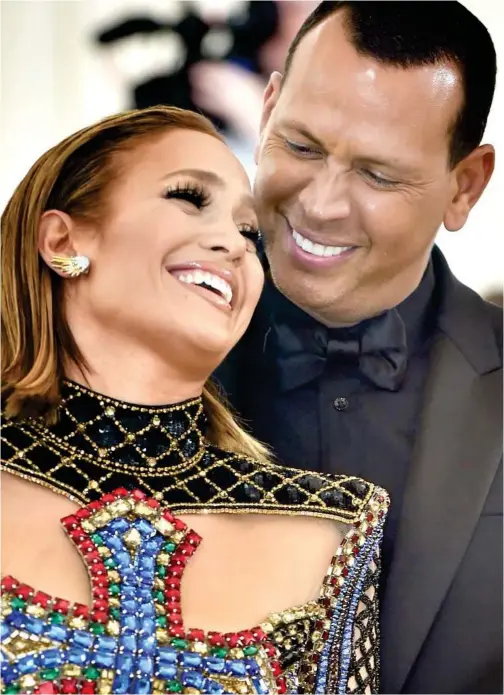  ?? Agence France-presse ?? Jennifer Lopez and Alex Rodriguez arrive for the Met Gala at the Metropolit­an Museum of Art in New York.