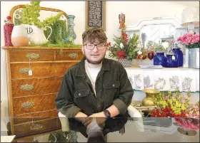  ?? (Special to the NWA Democrat-Gazette/Denise Nemec) ?? Carter Collins, at the age of 19, opened his own flower shop on Lincoln Square, called Carter’s Flowers and More. He has been saving for the business since he was 9 years old.