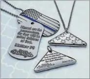  ?? SUBMITTED ?? Point 27, an Atlanta-based global nonprofit founded by a retired U.S. Army colonel, sent Thin Blue Line scripturei­nscribed dog tags called Shields of Strength to the Mentor Police Department to honor fallen officer Mathew Mazany.
