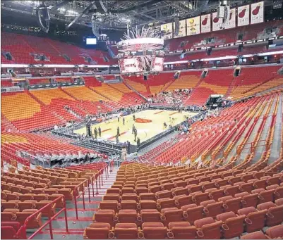  ?? DAVID SANTIAGO/MIAMI HERALD ?? Venues such as AmericanAi­rlines Arena in Miami have remained empty since mid-March as sports went on a hiatus during the pandemic.