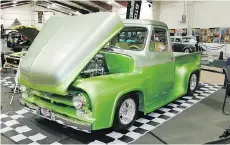  ??  ?? This lowered 1955 Ford F100 pickup features an eye-catching two-tone paint job — in green, of course!