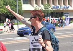  ?? NATHAN J. FISH/THE REPUBLIC ?? Judith Danvers rallies outside Sen. Jeff Flake's Phoenix office on Saturday to protest the confirmati­on of Judge Brett Kavanaugh.