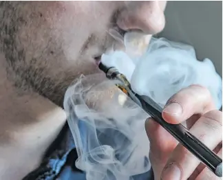  ??  ?? Vaping can damage vital immune system cells and may be more harmful than previously thought, a study suggests.