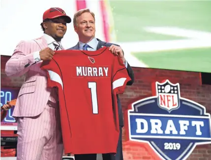  ?? CHRISTOPHE­R HANEWINCKE­L/USA TODAY SPORTS ?? After a Heisman Trophy-winning season at Oklahoma, Kyler Murray was selected by the Cardinals with the first pick in the NFL draft Thursday in Nashville.