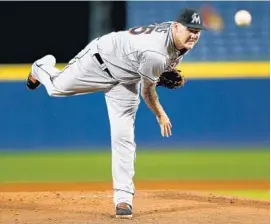  ?? MIKE ZARRILLI/GETTY IMAGES ?? Pitcher Mat Latos recorded his first win in six starts this week against the Washington Nationals. His record is now 1-3, with a 5.60 ERA.