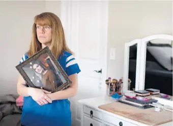  ?? BRIAN CASSELLA/CHICAGO TRIBUNE ?? Deborah Simental stands inside her late daughter’s bedroom on Wednesday in Tinley Park. Sarah Simental, 18, died of COVID-19 in December.