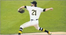  ?? GENE J. PUSKAR — THE ASSOCIATED PRESS ?? Pirates starting pitcher JT Brubaker delivers during the first inning against the White Sox in Pittsburgh, on Wednesday. To commemorat­e Roberto Clemente Day, the Pirates all wore Clemente’s No. 21.