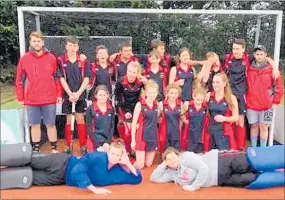  ??  ?? Mixed Hockey team in Whanganui — back left to right — Shaun Nager (Coach), Ryan Hiestand, Kobie Hey, Finn Booker, Isaac Farley-Hancock, Leon Howells, Julia Howatson, Troy Howells, Tom Bennett, Curtis Boyde (Coach). Middle- Ashley Collings-Hughes, Nicola van der Westhuizen, Emma Baldock, Charlotte Mitchell, Meg Baldock, Janika Hey Lying down in front — Josh Smart and Demi Ward