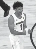  ?? JOHN LOCHER/AP ?? Arizona State guard Remy Martin led the Pac-12 in scoring (19.1 points per game) last season, his fourth with the Sun Devils.