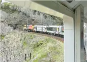  ?? ?? The Northern Explorer passenger train makes several stops between Wellington and Auckland, encouragin­g exploratio­n.