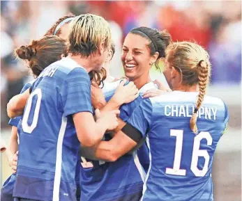  ?? JIM BROWN, USA TODAY SPORTS ?? Carli Lloyd, second from right, was the star of Team USA’s run to the 2015 World Cup title.