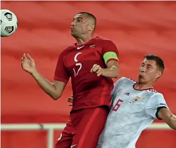  ??  ?? Target man…Yilmaz holds off Hungary’s Willi Orban