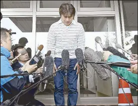  ?? AP ?? Takayuki Tanooka bows in front of reporters after his son Yamato was found in Hokkaido yesterday.
