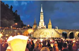  ??  ?? i Golden light: a candle procession at Lourdes Sanctuary. i Above right: the site where it is believed that Jesus Christ performed his first miracle in the southern Lebanese village of Qana