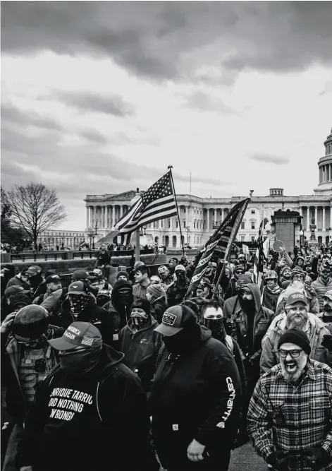  ??  ?? Pro-trump protesters gather in front of the Capitol on Jan. 6.