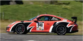  ??  ?? Runaway winners of the Global Security Modern 2WD class were Dunedin duo Martin Dippie and Jona Grant in a Porsche GT3 RS.