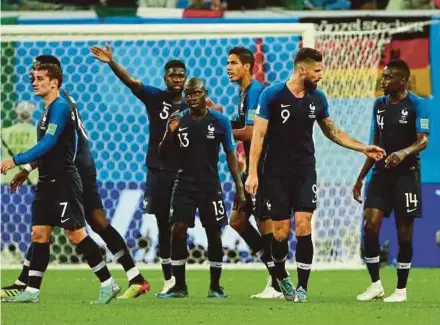  ?? REUTERS PIC ?? (From left) France’s Antoine Griezmann, Samuel Umtiti, N'Golo Kante, Raphael Varane, Olivier Giroud and Blaise Matuidi react in the World Cup semi-final against Belgium on Tuesday.