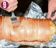  ??  ?? Remove foil and poke skin with fork. Put it back in the oven, increasing temperatur­e to 220°C. Continue roasting for 30-45 minutes or until skin is brown and crispy. Allow to cool for a few minutes. Remove lemongrass stalks when ready to cut.