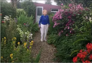 ??  ?? Iris Dungan in her garden at Monart, which she had hoped to open later this month as a fundraiser for County Wexford Community Workshop before Covid-19 halted her plans.