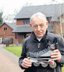  ?? Rollerblad­er Geoff Dornan outside his home in Ormskirk DENNIS BRADBURY ??