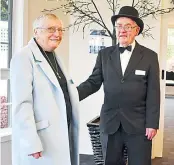  ?? ?? Warragul Arthritis Self Help Group member Norma Baylis is greeted by group welfare officer Ray Brydon who was dressed up for the occasion.