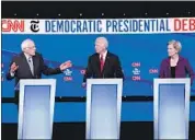  ?? Saul Loeb AFP/Getty Images ?? THE THREE septuagena­rian candidates, Bernie Sanders, left, Joe Biden and Elizabeth Warren, sought to assure voters they’re hardy enough to be president.