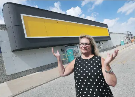  ?? DAN JANISSE ?? Tecumseh Mall general manager Colleen Conlin stands in front of what will be a Giant Tiger and a Petsmart in the Windsor mall. Conlin says another tenant is expected to take up most of the space that had been leased by Sobeys, which left in 2014.