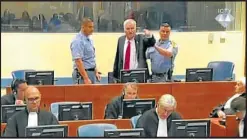  ?? AFP/INTERNATIO­NAL CRIMINAL TRIBUNAL FOR THE FORMER YUGOSLAVIA ?? Bosnian Serb wartime military chief Ratko Mladic yells angrily during his trial by the Internatio­nal Criminal Tribunal for the former Yugoslavia.