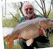  ??  ?? I let Brian Skoyles With a wink, for this carp claim 19lb 15oz