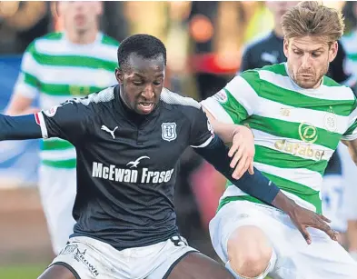  ??  ?? Boss Neil McCann, top, suffers with the fans when the Dark Blues lose as he is also a supporter, having played for the club as a 16-year-old; Glen Kamara up against Celtic’s Stuart Armstrong.