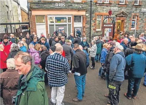  ?? Picture: Steve MacDougall. ?? Local residents and supporters protest the closure of the RBS branch in Aberfeldy.