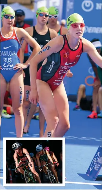  ??  ?? RIGHT Tyler Mislawchuk tags Joanna Brown at the Hamburg ITU Triathlon Mixed Relay World Champs.