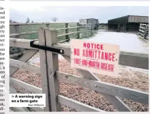  ?? Alan Williams ?? > A warning sign on a farm gate