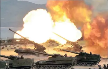  ??  ?? This image was released this week showing a ‘combined fire demonstrat­ion’ to celebrate the 85th anniversar­y of the North Korean army. A North Korean mid-range ballistic missile apparently failed shortly after launch yesterday in what the US saw as a...