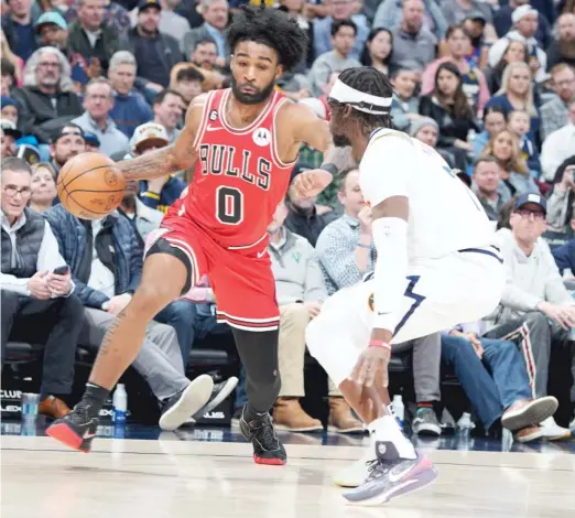  ?? DAVID ZALUBOWSKI/AP ?? In his fourth season, point guard Coby White has ratcheted up his physicalit­y after getting advice from teammate Alex Caruso.