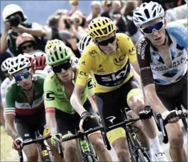  ?? JEFF PACHOUD PHOTO VIA AP ?? Chris Froome, second from right, climbs with Romain Bardet, right, Colombia’s Rigoberto Uran, second left, and Italy’s Fabio Aru, left, during the 15th stage of the Tour de France.