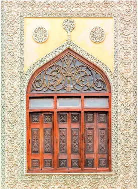  ??  ?? This page, clockwise from top left, Intricate stucco work on one of two windows that flank the Durbar Hall; Views of Mecca Masjid and Charminar from Chowmahall­a Palace; The grand library at Taj Falaknuma Palace; The Jade Room at Falaknuma Opposite,
from left, Laad Barzaar stretches a mile from the Charminar; 16th century Charminar has been liked to the Arc De Triomphe