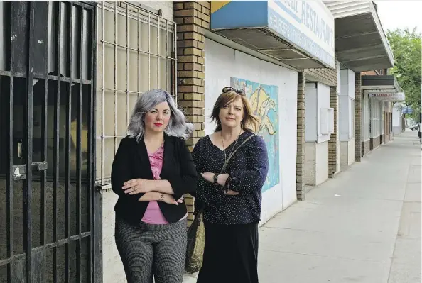  ?? LARRY WONG ?? Vacant storefront­s along Alberta Avenue highlight the need for sustained support of the neighbourh­ood revitaliza­tion effort, say Amanda Nielsen, left, owner of the Norwood Dental Clinic, and Christy Morin, Arts on the Avenue executive director, shown...