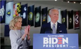  ??  ?? Democratic presidenti­al candidate Joe Biden speaks with his wife Jill at his side during a primary night speech at the National Constituti­on Center in Philadelph­ia, Pennsylvan­ia, on Tuesday night. Photograph: Brendan McDermid/Reuters