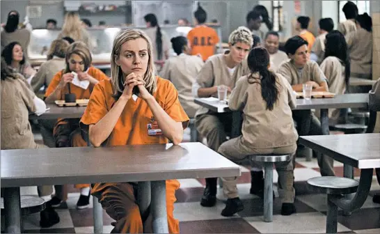  ?? JESSICA MIGLIO/NETFLIX ?? Taylor Schilling stars in “Orange Is the New Black,” which premiered in 2013. The series is wrapping up with a seventh season.