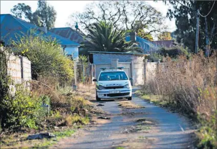  ?? Photo: Delwyn Verasamy ?? On patrol: Police drive through West Village on the outskirts of Krugersdor­p during a clampdown on artisanal mining. Police have been accused of being in cahoots with criminal mining syndicates.