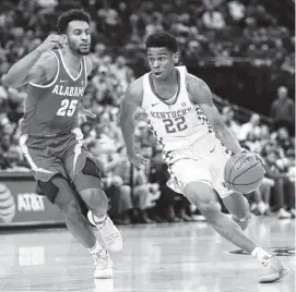  ?? THE ASSOCIATED PRESS ?? Kentucky’s Shai Gilgeous-Alexander, right, brings the ball downcourt past Alabama’s Braxton Key during the second half Saturday in St. Louis. Gilgeous-Alexander, a former Hamilton Heights player, scored 19 points in Kentucky’s 86-63 win.