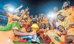  ?? EPA ?? Ivory Coast players celebrate after beating Ghana to win the Africa Cup of Nations.