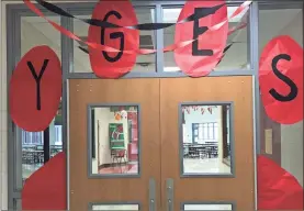  ?? / Contribute­d ?? Youngs Grove Elementary decorated the front door to the rest of the campus with a Bulldog paw print to welcome students back on Friday.